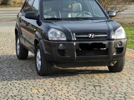 Черный Хендай Туксон, объемом двигателя 2 л и пробегом 217 тыс. км за 7195 $, фото 1 на Automoto.ua