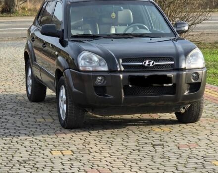 Чорний Хендай Туксон, об'ємом двигуна 2 л та пробігом 217 тис. км за 7195 $, фото 1 на Automoto.ua