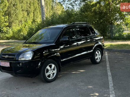 Хендай Туксон 2006 у Полтаві на Automoto.ua Чорний Хендай Туксон, об'ємом двигуна 2 л та пробігом 266 тис. км за 7700 $, фото 1 на Automoto.ua