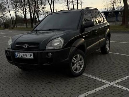 Черный Хендай Туксон, объемом двигателя 1.99 л и пробегом 334 тыс. км за 6300 $, фото 1 на Automoto.ua