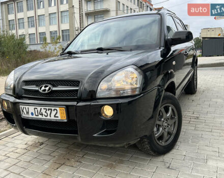 Чорний Хендай Туксон, об'ємом двигуна 2 л та пробігом 144 тис. км за 6599 $, фото 1 на Automoto.ua