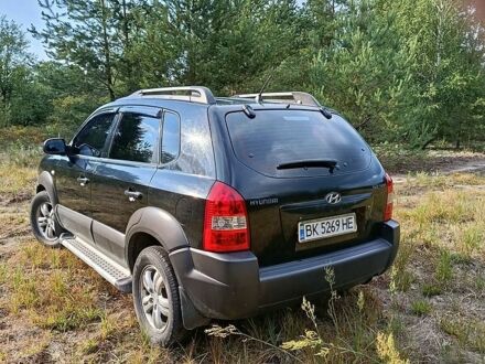 Чорний Хендай Туксон, об'ємом двигуна 1.98 л та пробігом 200 тис. км за 7000 $, фото 1 на Automoto.ua