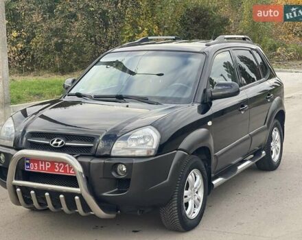 Чорний Хендай Туксон, об'ємом двигуна 1.98 л та пробігом 258 тис. км за 7500 $, фото 1 на Automoto.ua