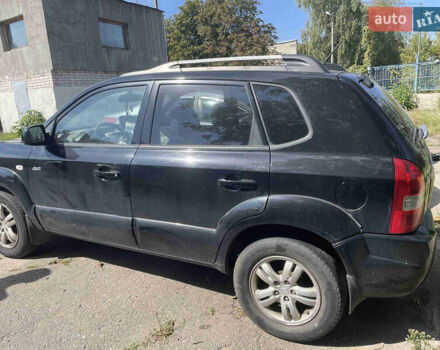 Чорний Хендай Туксон, об'ємом двигуна 2 л та пробігом 263 тис. км за 4800 $, фото 1 на Automoto.ua