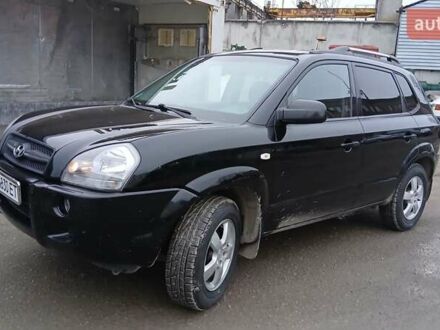 Черный Хендай Туксон, объемом двигателя 1.98 л и пробегом 320 тыс. км за 6500 $, фото 1 на Automoto.ua
