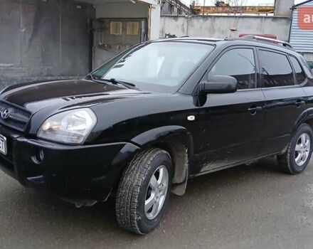 Черный Хендай Туксон, объемом двигателя 1.98 л и пробегом 320 тыс. км за 6500 $, фото 1 на Automoto.ua