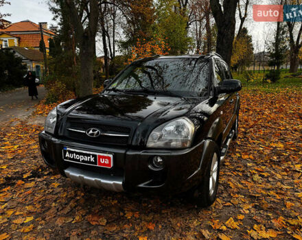 Черный Хендай Туксон, объемом двигателя 2 л и пробегом 210 тыс. км за 7990 $, фото 1 на Automoto.ua