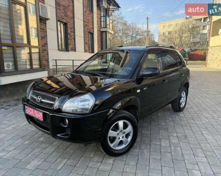 Черный Хендай Туксон, объемом двигателя 2 л и пробегом 249 тыс. км за 7450 $, фото 1 на Automoto.ua