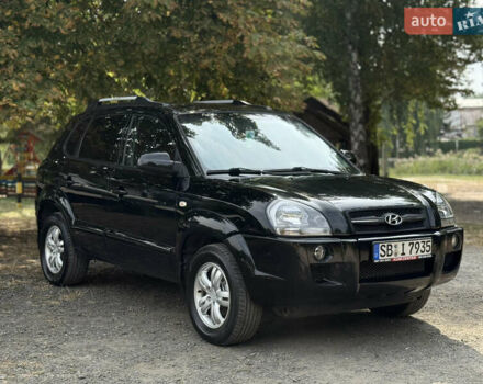 Черный Хендай Туксон, объемом двигателя 2 л и пробегом 144 тыс. км за 7999 $, фото 1 на Automoto.ua