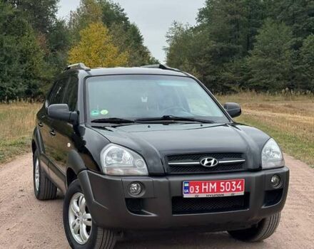 Черный Хендай Туксон, объемом двигателя 2 л и пробегом 209 тыс. км за 7600 $, фото 1 на Automoto.ua