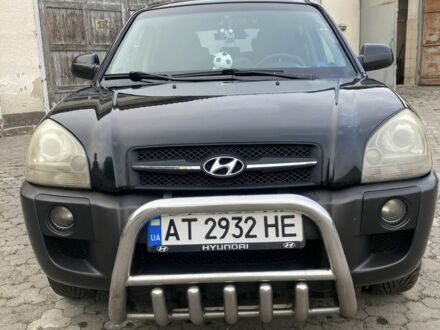 Черный Хендай Туксон, объемом двигателя 2 л и пробегом 248 тыс. км за 6500 $, фото 1 на Automoto.ua