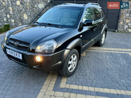 Черный Хендай Туксон, объемом двигателя 1.98 л и пробегом 197 тыс. км за 7790 $, фото 1 на Automoto.ua