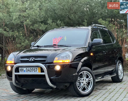 Чорний Хендай Туксон, об'ємом двигуна 1.98 л та пробігом 170 тис. км за 6999 $, фото 1 на Automoto.ua