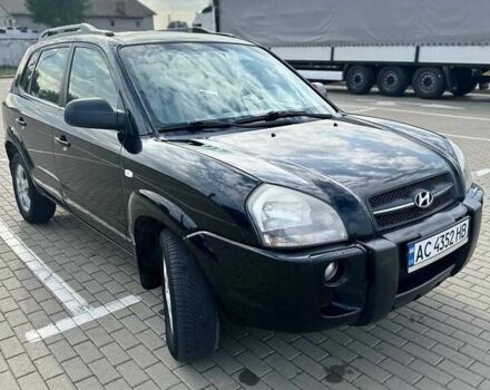 Черный Хендай Туксон, объемом двигателя 2 л и пробегом 277 тыс. км за 6000 $, фото 1 на Automoto.ua