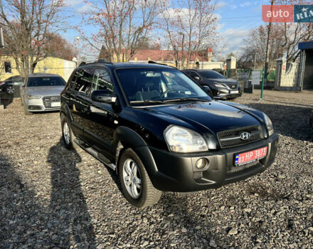 Черный Хендай Туксон, объемом двигателя 1.98 л и пробегом 191 тыс. км за 8300 $, фото 1 на Automoto.ua