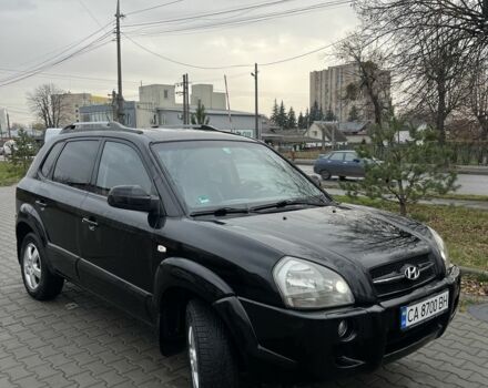 Черный Хендай Туксон, объемом двигателя 2 л и пробегом 242 тыс. км за 6999 $, фото 1 на Automoto.ua