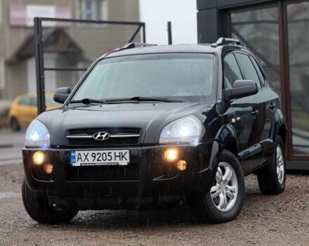 Черный Хендай Туксон, объемом двигателя 2 л и пробегом 263 тыс. км за 7950 $, фото 1 на Automoto.ua