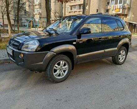 Черный Хендай Туксон, объемом двигателя 1.98 л и пробегом 256 тыс. км за 8000 $, фото 1 на Automoto.ua