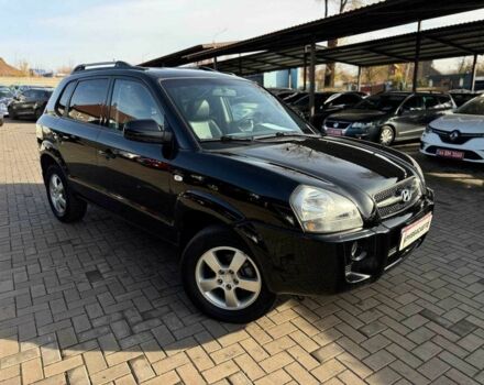 Черный Хендай Туксон, объемом двигателя 2 л и пробегом 207 тыс. км за 8000 $, фото 1 на Automoto.ua