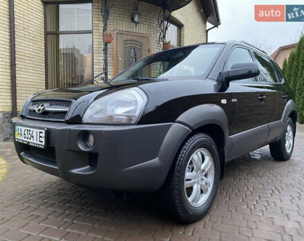 Черный Хендай Туксон, объемом двигателя 1.99 л и пробегом 186 тыс. км за 9400 $, фото 1 на Automoto.ua