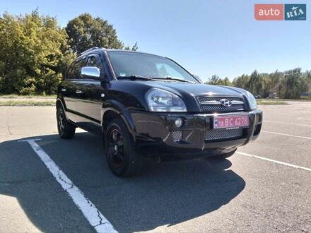 Чорний Хендай Туксон, об'ємом двигуна 1.98 л та пробігом 184 тис. км за 7690 $, фото 1 на Automoto.ua