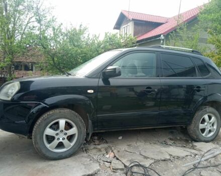 Черный Хендай Туксон, объемом двигателя 2 л и пробегом 217 тыс. км за 7200 $, фото 1 на Automoto.ua