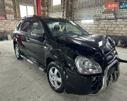 Черный Хендай Туксон, объемом двигателя 2 л и пробегом 252 тыс. км за 3000 $, фото 1 на Automoto.ua