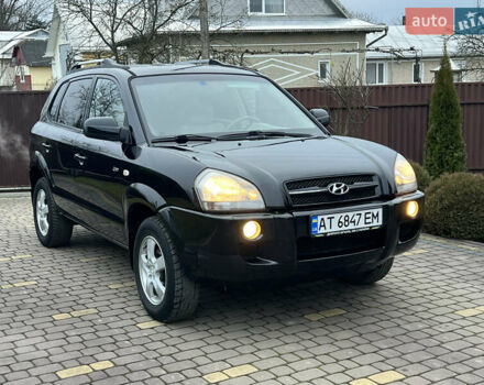 Черный Хендай Туксон, объемом двигателя 1.98 л и пробегом 185 тыс. км за 6850 $, фото 1 на Automoto.ua
