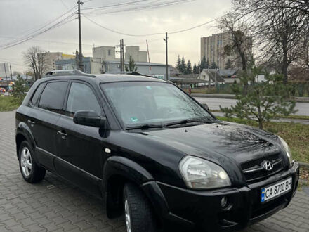 Черный Хендай Туксон, объемом двигателя 2 л и пробегом 242 тыс. км за 6999 $, фото 1 на Automoto.ua