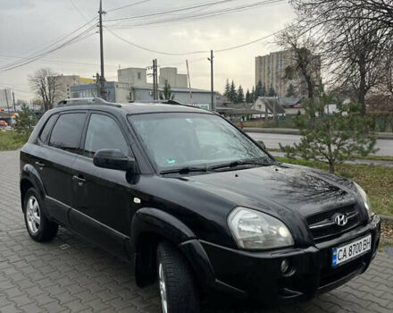 Черный Хендай Туксон, объемом двигателя 2 л и пробегом 242 тыс. км за 6999 $, фото 1 на Automoto.ua