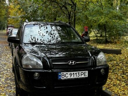 Черный Хендай Туксон, объемом двигателя 2 л и пробегом 240 тыс. км за 5600 $, фото 1 на Automoto.ua