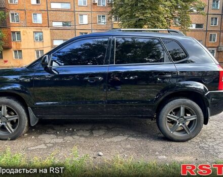 Черный Хендай Туксон, объемом двигателя 2 л и пробегом 18 тыс. км за 6900 $, фото 1 на Automoto.ua