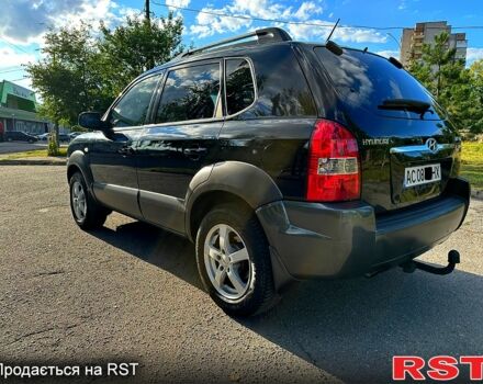 Чорний Хендай Туксон, об'ємом двигуна 2 л та пробігом 250 тис. км за 5600 $, фото 1 на Automoto.ua