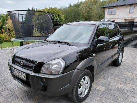 Черный Хендай Туксон, объемом двигателя 2 л и пробегом 298 тыс. км за 2200 $, фото 1 на Automoto.ua