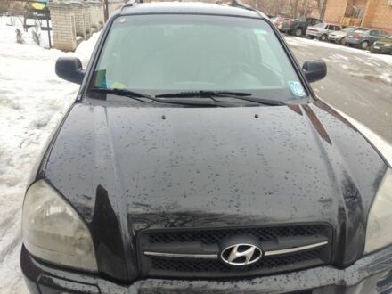 Чорний Хендай Туксон, об'ємом двигуна 2 л та пробігом 260 тис. км за 7200 $, фото 1 на Automoto.ua