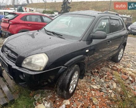 Черный Хендай Туксон, объемом двигателя 2 л и пробегом 151 тыс. км за 3500 $, фото 1 на Automoto.ua