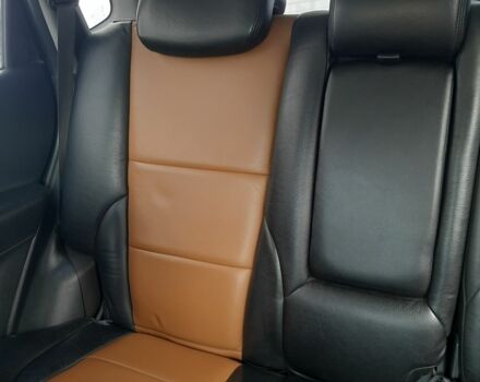 Черный Хендай Туксон, объемом двигателя 2 л и пробегом 230 тыс. км за 7000 $, фото 1 на Automoto.ua