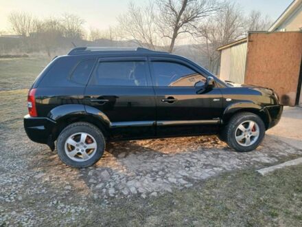 Чорний Хендай Туксон, об'ємом двигуна 2 л та пробігом 180 тис. км за 7400 $, фото 1 на Automoto.ua