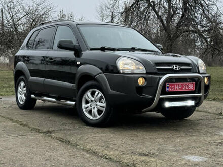 Чорний Хендай Туксон, об'ємом двигуна 2 л та пробігом 201 тис. км за 7750 $, фото 1 на Automoto.ua