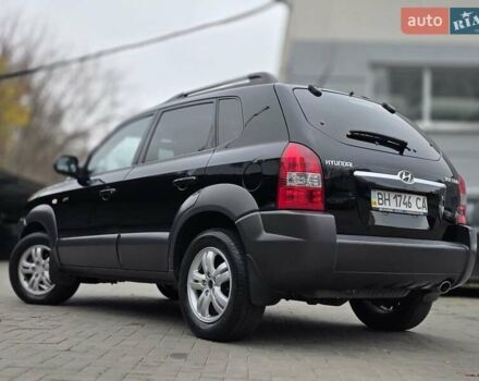 Чорний Хендай Туксон, об'ємом двигуна 1.98 л та пробігом 123 тис. км за 7950 $, фото 1 на Automoto.ua