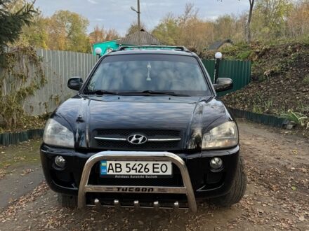 Черный Хендай Туксон, объемом двигателя 2 л и пробегом 210 тыс. км за 7200 $, фото 1 на Automoto.ua