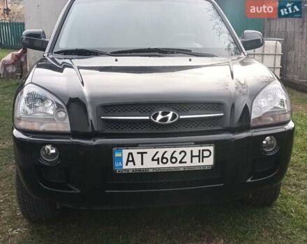 Черный Хендай Туксон, объемом двигателя 2 л и пробегом 247 тыс. км за 6300 $, фото 1 на Automoto.ua