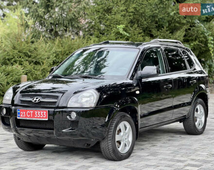 Черный Хендай Туксон, объемом двигателя 2 л и пробегом 187 тыс. км за 7550 $, фото 1 на Automoto.ua