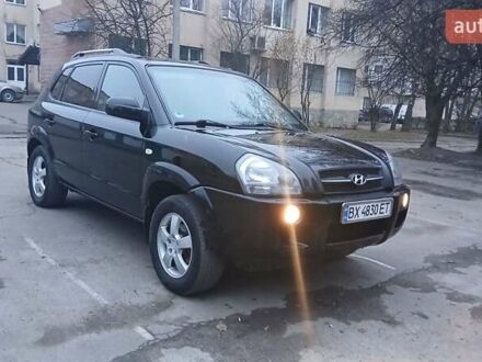Черный Хендай Туксон, объемом двигателя 1.98 л и пробегом 320 тыс. км за 6300 $, фото 1 на Automoto.ua