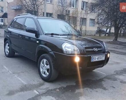 Черный Хендай Туксон, объемом двигателя 1.98 л и пробегом 320 тыс. км за 6300 $, фото 1 на Automoto.ua
