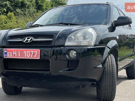Чорний Хендай Туксон, об'ємом двигуна 2 л та пробігом 236 тис. км за 6950 $, фото 1 на Automoto.ua
