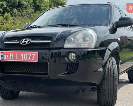 Черный Хендай Туксон, объемом двигателя 2 л и пробегом 236 тыс. км за 6950 $, фото 1 на Automoto.ua