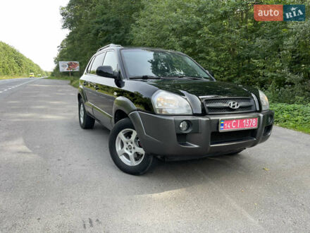 Черный Хендай Туксон, объемом двигателя 2 л и пробегом 174 тыс. км за 7600 $, фото 1 на Automoto.ua
