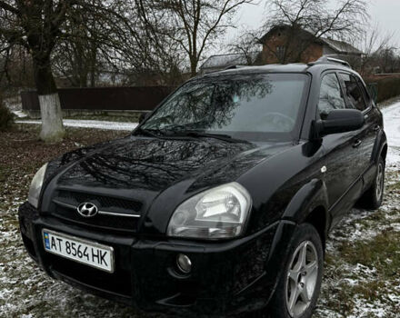 Черный Хендай Туксон, объемом двигателя 1.99 л и пробегом 317 тыс. км за 6300 $, фото 1 на Automoto.ua