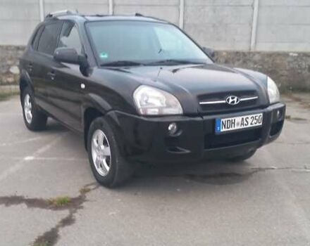 Черный Хендай Туксон, объемом двигателя 1.98 л и пробегом 155 тыс. км за 7999 $, фото 1 на Automoto.ua